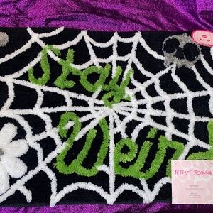 Betsey Johnson "stay weird" Halloween bath mat
